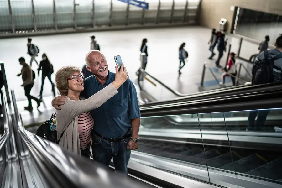 Couple taking a selfie at the airport